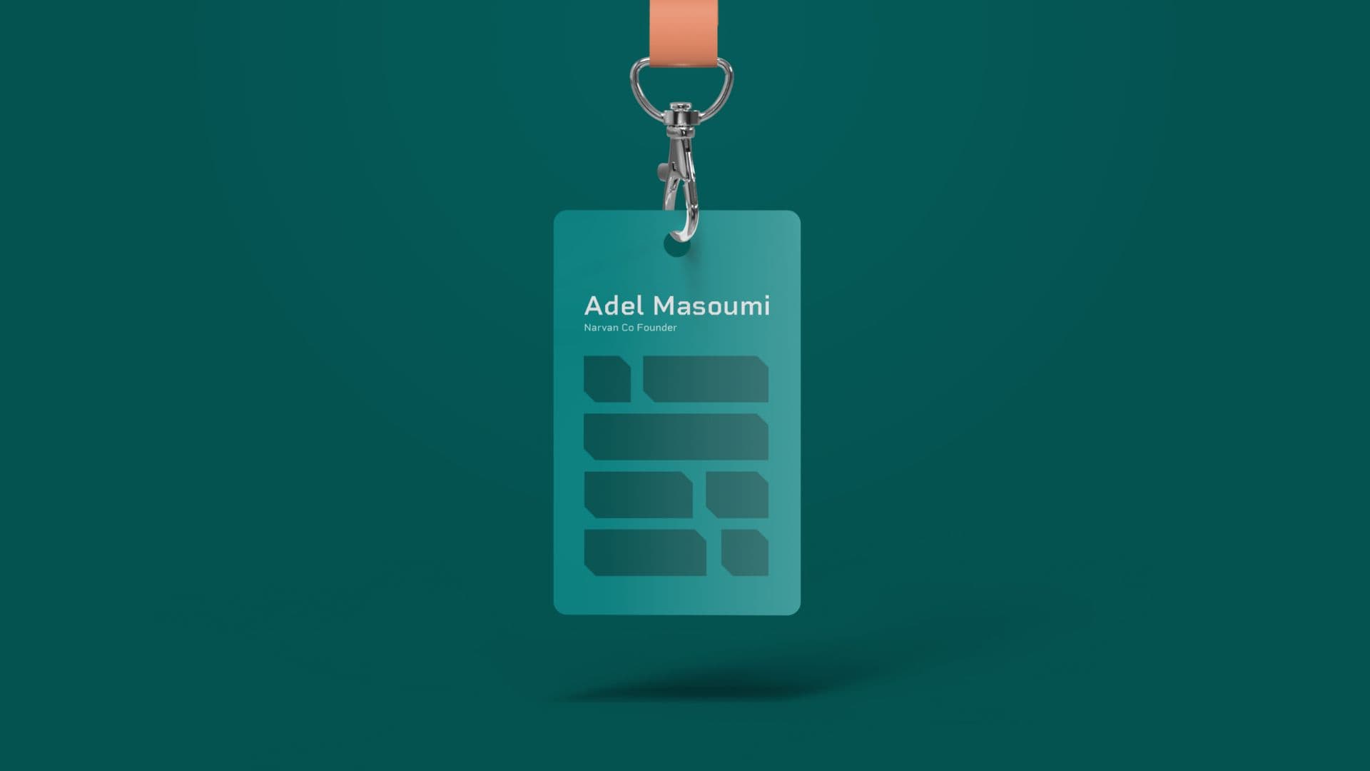 A teal Narvan ID badge hanging from an orange lanyard, the brick pattern under the holder's name.